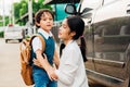 Family happy mother mom send children kid son boy kindergarten to school Royalty Free Stock Photo