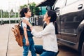 Family happy mother mom send children kid son boy kindergarten to school Royalty Free Stock Photo