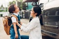 Family happy mother send children kid son boy kindergarten to school Royalty Free Stock Photo