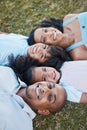 Family, happy portrait and lying on grass in garden with mother, father and kids together with love. Face, top view and Royalty Free Stock Photo