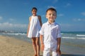 Family has fun at the seashore in summertime Royalty Free Stock Photo