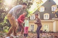 Family have fun together at backyard. On the move. Royalty Free Stock Photo