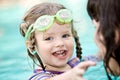 Family have rest in swimming pool. Royalty Free Stock Photo