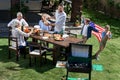 Family having barbecue while celebrating 4th july together