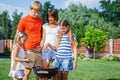 Family having barbecue Royalty Free Stock Photo