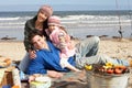 Family Having Barbeque On Winter Beach Royalty Free Stock Photo