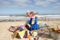 Family Having Barbeque On Winter Beach Royalty Free Stock Photo