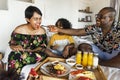 Family having breakfast in bed Royalty Free Stock Photo