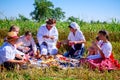 Family are having breakfast at traditional wheat harvest Royalty Free Stock Photo