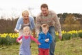 Family Having Egg And Spoon Race