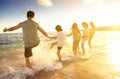 family having fun on the beach Royalty Free Stock Photo