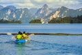 Family having fun in a Canoe on  Ratchaprapha Dam Royalty Free Stock Photo