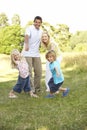 Family having fun in countryside Royalty Free Stock Photo