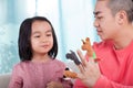 Family having fun with hand puppets