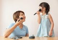 Family having fun with makeup. Royalty Free Stock Photo