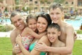 Family having fun near pool Royalty Free Stock Photo