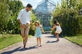 Family Having Fun Outdoor. Happy Young Parents, Children Playing Royalty Free Stock Photo