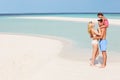 Family Having Fun In Sea On Beach Holiday