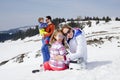 Family having fun in the snow