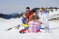 Family having fun in the snow