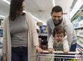 Family having fun in the supermarket Royalty Free Stock Photo