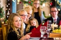 Family having German Christmas dinner