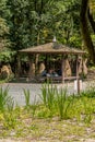 Family having lunch in covered pavilion at mountain park