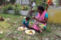 A family having lunch in Kumrokhali, West Bengal, India