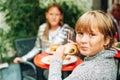 Family having lunch outside on a terrace Royalty Free Stock Photo