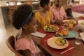 Family having meal together on dining table Royalty Free Stock Photo