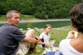 Family having a picnic in the mountains Royalty Free Stock Photo