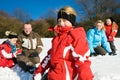 Family having a snowball fight Royalty Free Stock Photo