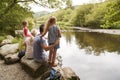 Family On Hike Looking Out Over River In UK Lake District Royalty Free Stock Photo