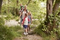 Family Hiking Along Path By River In UK Lake District Royalty Free Stock Photo