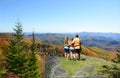 Family hiking in autumn mountains. Royalty Free Stock Photo