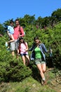 Family on a hiking day in mountains Royalty Free Stock Photo