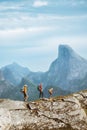Family hiking expedition in mountains active vacations, parents and child traveling in Norway outdoor Royalty Free Stock Photo