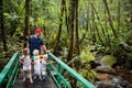 Family hiking in jungle Royalty Free Stock Photo