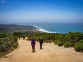 Family hiking in Montara, California with beach and ocean