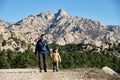 Family hiking in the mountains. A mother and her son take a hike together in the mountains Royalty Free Stock Photo