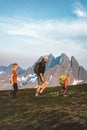 Family hiking in mountains outdoor parents and child together traveling in Norway healthy lifestyle adventure vacations