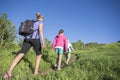 Family hiking together in the mountains Royalty Free Stock Photo