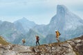 Family hiking together in Norway mountains, active vacations outdoor. Parents and child traveling healthy lifestyle Royalty Free Stock Photo