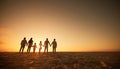 Family, holding hands beach at sunset and generations, grandparents travel with parents and kids with orange sky. Back Royalty Free Stock Photo