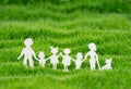 Family Holding Hands Together - Happy Family Concept - Paper Silhouettes on Grass