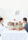 Family holding their hands while praying Royalty Free Stock Photo