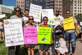 Family Holds Signs to End Family Separation at Immigration Rally