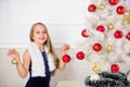 Family holiday concept. Girl velvet dress feel festive near christmas tree. Very special time of year. Spread christmas Royalty Free Stock Photo