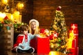 Family holiday. Happy family. Mom and kid play together christmas eve. My dear baby santa. Mother and little child boy Royalty Free Stock Photo