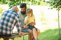 Family holiday and togetherness. Grandfather portrait on blue sky backgrounds. Parenthood. Summer and active holidays.